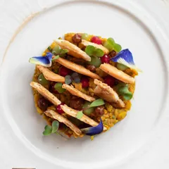 Every dish is a canvas. This is our Khasta Matar Chaat, a beautiful arrangement of textures and colors that reinterprets a classic street food dish with artistic flair and elevated flavors.