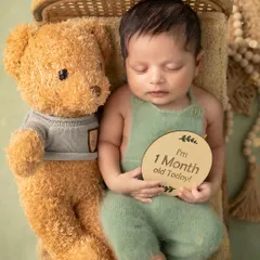 A calm and peaceful soul. This one-month-old melted our hearts with his sweet, sleepy expressions. It was pure joy to capture these quiet moments.