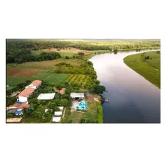 This aerial view shows one of my earlier resort projects in Dandeli, nestled by the river. Over time, the landscape has matured and taken over, blurring the lines between the architecture and the wild context of the Western Ghats.