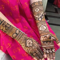 Celebrating a new beginning with a custom baby shower mehandi. This design includes a baby in a pram, the words "Baby Attal," and a special motif for the mother.