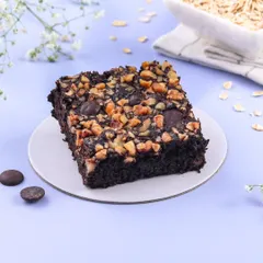 The Oats Jaggery Brownie is a guilt-free indulgence. It's made with wholesome oats and sweetened with jaggery, but still has that fudgy texture you love.