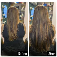 For this client, we added just enough length and volume to enhance her natural hair. The 'after' shows a thicker, more luxurious version of her own style.