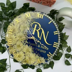 A slightly different angle of the personalized clock, showing how the light reflects off the glossy resin surface and the golden Roman numerals.