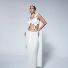 This look for House of R showcases my approach to modern, minimalist styling. The focus is on the innovative drape of the contemporary white saree and the clean silhouette, creating a powerful and chic statement for their Spring/Summer lookbook.
