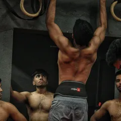 Pull-ups are a staple in our gym. They build the raw upper body strength needed for punching power and clinching.
