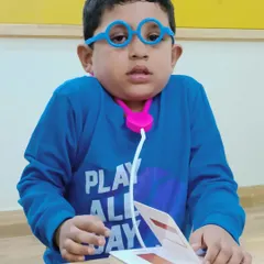 A future doctor is ready for his patients. Role-playing activities like this help children understand different professions and their importance in our community.