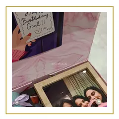 "Don't keep calm, it's your girl's birthday!" This vibrant hamper is filled with everything a best friend would love, including a personalized photo frame, all packed in a pretty pink marble-print box.