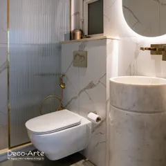 A collection of my bathroom designs, from a modern space with bold emerald fish-scale tiles to a luxurious retreat with white marble and gold fixtures. Each design is crafted to be a personal sanctuary.