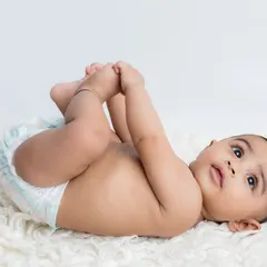 Grabbing those tiny toes! This is such a classic and cute baby pose that I love to capture.