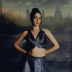 A sleek and powerful high bun for a futuristic campaign with designer Amit Aggarwal. This style creates a strong, clean silhouette that complements the structural design of the outfit.