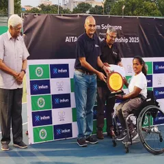 A triumphant moment at the INDIUM AITA Tennis Championship in Chennai, where our athlete is presented with the singles winner trophy. We celebrate every victory as a milestone in a player's journey.