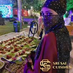 A close-up of our hostess at the Arabian Paan station, dressed in thematic attire. She is ready to serve freshly prepared paan, adding an element of interactive and personalized service that guests are sure to remember.