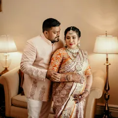 Capturing a beautiful moment between the expecting parents. Her makeup was designed to be picture perfect from every angle, ensuring these memories are cherished forever.