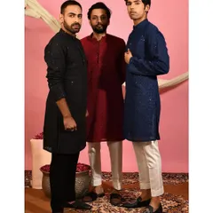 Here you can see a selection of my festive kurtas worn by the Sabre clan. This image showcases the variety of colors available, including classic black, deep maroon, and navy blue, each featuring my signature embroidery.