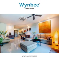 The Wynbee Smart Home app connects all your devices in one place. This living room setup demonstrates how you can turn on lights, adjust the fan, and control the AC, all from a single, unified application on your phone.