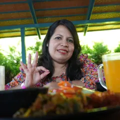 A happy guest enjoying our delicious and varied buffet spread. We make sure there's something for everyone.