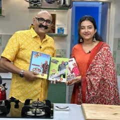Holding up the 'Bombat Bhojana' cookbooks with Sihi Kahi Chandru sir. It was an honor to be on the show.