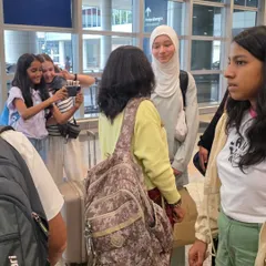 Our students at the airport, excited for their international journey. These experiences build their confidence both on and off the mat.