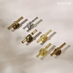 The bamboo-inspired handle is available in all 32 of my signature finishes. This image displays a selection, from polished chrome to burnished brass, illustrating how the same design can be adapted to suit a variety of decor styles.