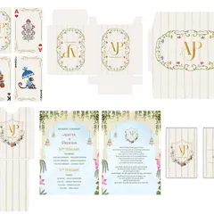 This is a preview of a complete wedding stationery project, showing how a custom monogram can create a cohesive brand for your wedding. From the invitation and envelope to custom playing cards and room tags, every piece feels connected.