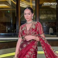 A frontal view of this classic bridal look, showcasing the flawless skin work and defined eyes that radiate sophistication.
