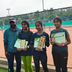 Here I am with our Girls Under 14 and Under 12 champions and semifinalists. It is moments like these, seeing the progress and success of Kanisha, Hamsini, Ishanee, and Hasini, that drive my passion for coaching.