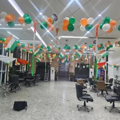 For this office space, I used tricolor balloon bunches and Indian flag streamers to create a festive ceiling decoration for Independence Day celebrations.