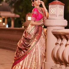 I love transforming a traditional Kanjeevaram silk saree into a contemporary lehenga style. This look is perfect for a sangeet or reception, and I can show you how to create this stunning silhouette that combines comfort with regal elegance.