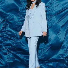 For the stunning Sushmita Sen, I created this chic, monochromatic look in powder blue. The three piece ensemble, featuring a blazer with a matching choker detail, is all about sophisticated and effortless elegance, perfect for a high profile celebrity appearance.