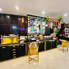 A modern and elegant choice for any reception. This beautiful black and gold buffet setup shows a different style of decor I can arrange, perfect for a chic evening event.