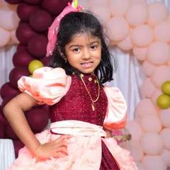 A close-up of the birthday girl. The soft colors and fun textures were chosen just for her, making her feel like the main character on her big day.