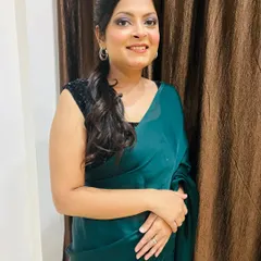 A smiling shot of my client, looking radiant with her party makeup and hairstyle. The side-swept hair keeps the look clean and elegant.