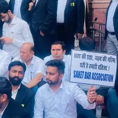 Holding a sign for the Saket Bar Association during our protest. Our pledge is to uphold the path of truth and the dignity of justice.