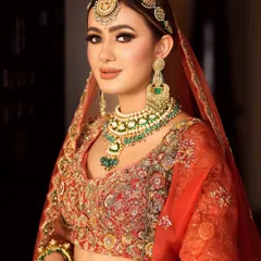 A close-up showcasing the detailed eye makeup and the perfect bridal glow. The balance of shimmer and matte textures creates a multi-dimensional look.