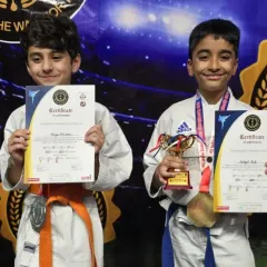 The look of pure joy and accomplishment. Seeing my students with their hard-earned medals, trophies, and certificates after a championship is what makes all the training worthwhile.