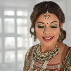 A timeless and graceful makeup look for the mother of the groom. I used my anti-aging techniques to create a lifted, fresh appearance with soft glam eyes and a warm, glowing complexion.