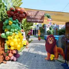 A grand entrance for a jungle-themed adventure. We go all out to create immersive worlds for our birthday parties, starting from the very first step your guests take into our venue.