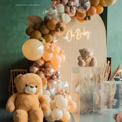 A wide shot of the teddy bear and balloon arch decor at a baby shower. Capturing the overall ambiance and decoration is a key part of my event photography service.
