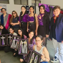 Mentoring students at the Janki Devi Vocational Centre is incredibly rewarding. I guide them on everything from initial sketches to final garment construction, helping them find their unique market edge. Seeing their creativity flourish is the best part of my collection mentorship program.