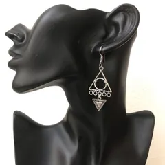 I love playing with shapes, and these geometric earrings are a great example. The triangular design gives them a modern, funky vibe while still being lightweight and easy to wear.