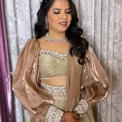 Bronzed to perfection. For my beautiful client's special event, I created a warm, bronzed makeup look with defined eyes and soft waves, making her glow from the inside out.