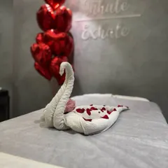 It's all in the details. A beautifully folded swan towel and scattered rose petals are small touches I use to make your experience feel special and luxurious.