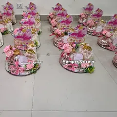 We prepared a large order of these elegant 'Baby Girl' hampers for a client's celebration.