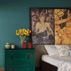This statement bed headboard, printed on textile, was inspired by the ancient cave paintings of Ajanta and Ellora. In collaboration with designers, we bridged history and contemporary style, bringing timeless artistry into the bedroom.