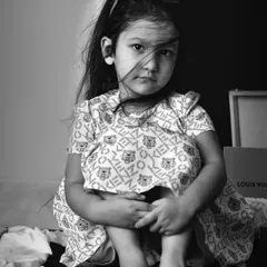 The same portrait in black and white, which adds a timeless and dramatic feel. We often provide both color and monochrome versions of our favorite shots.
