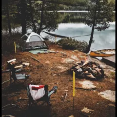 This is a typical setup at one of my lakeside spots near Bangalore. A comfortable tent, a hammock strung between trees, a canoe by the dock, and a campfire ready to be lit. It’s your perfect private getaway for the evening.
