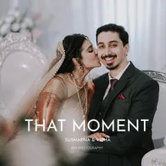 A sweet kiss on the cheek. This candid photo from their reception captures a spontaneous moment of affection and the groom's happy reaction.