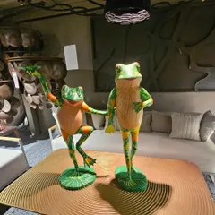 Add a touch of whimsy to your space with these colorful dancing frog sculptures. They are a fun and playful addition to any garden or tabletop.