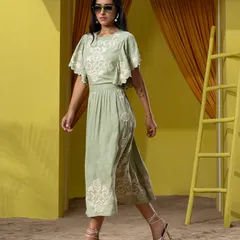 A full-length lookbook shot for Boho-Chic's summer collection. The sand-covered floor and custom props demonstrate our ability to facilitate immersive environments for fashion shoots.