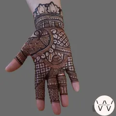 A beautiful Indian mehndi design with a lotus cuff.